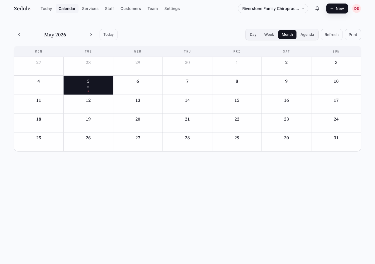 Mini-month picker popover open below the toolbar date label, showing today highlighted and dots on busy days